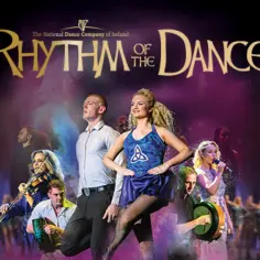 Tancerz w niebieskiej sukience i tancerz w białej koszuli na tle zespołu "Rhythm of the Dance".