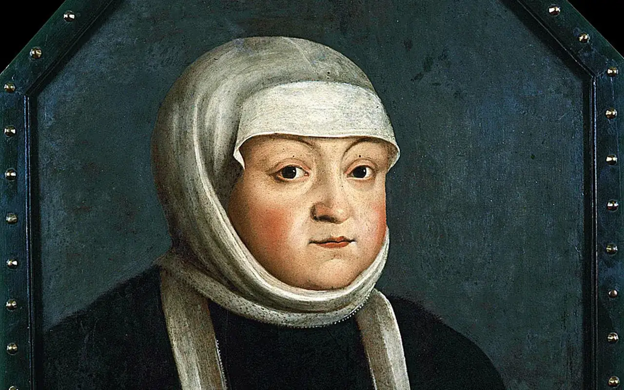 Portret królowej Bony w białym czepcu i czarnej sukni.